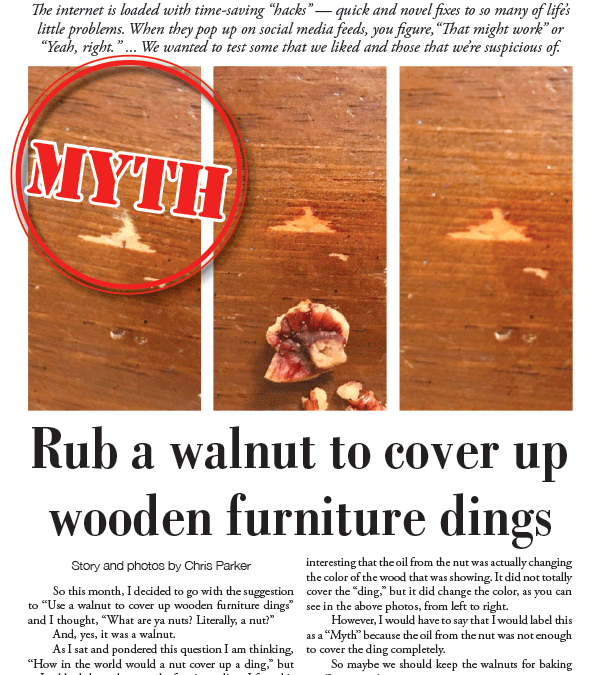 Rub a walnut to cover up wooden furniture dings